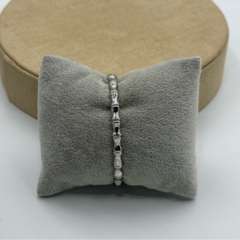 Elegant Silver tone bone design Bracelet